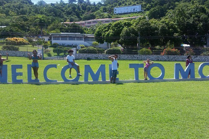 5. Montego Bay Private Highlite Sightseeing, SouvenirShoppingHalfDay Guided Tour - Margaritaville Montego Bay: Beach-Club Energy and Water-Play Fun