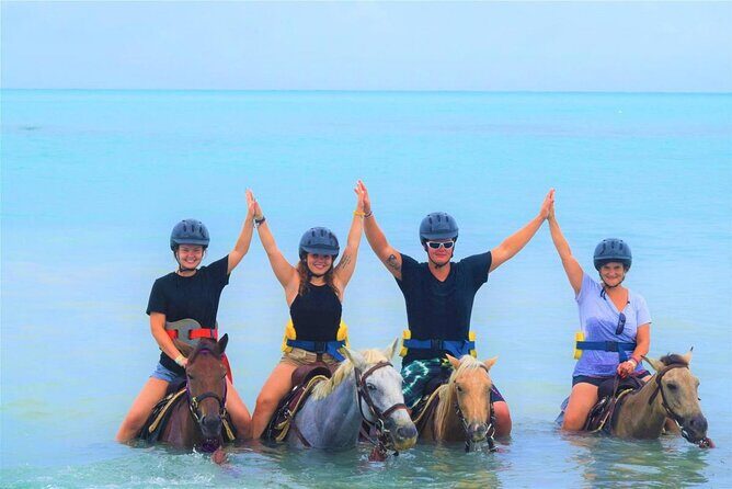 ATV, Zipline, Horseback, Bamboo Rafting & Catamaran Boat Jamaica - Horseback and Caribbean swim: a real pacing shift