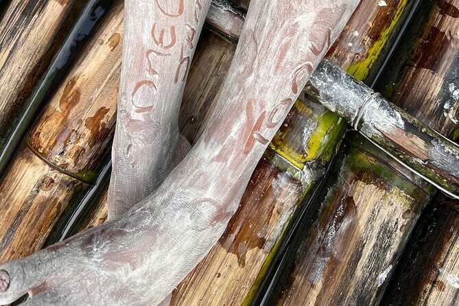 Bamboo rafting with limestone massage - The champagne, coconut straw, speaker, and birthday touches