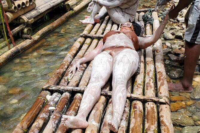 Bamboo Rafting with Limestone Massage at Lethe - Boarding the bamboo raft: your captain, the river, and the pace