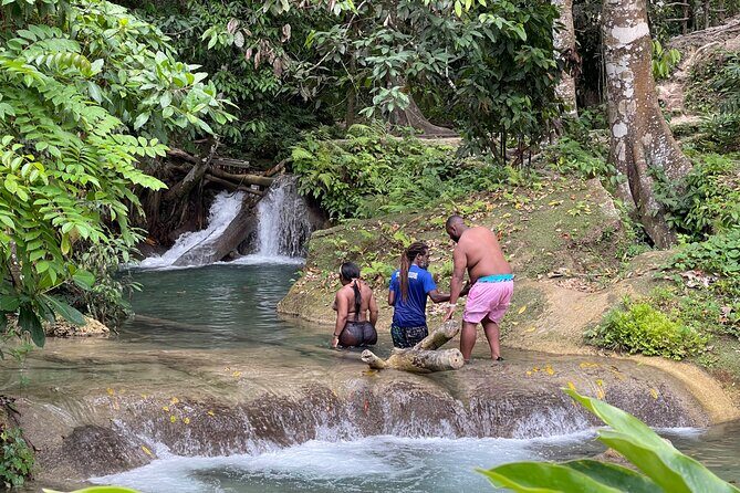 Benta River & Falls Private Tour From Montego Bay - Mud bath and underwater caves: messy, cool, and memorable