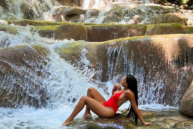 Blue Hole and Dunn's River Falls Ocho rios - Blue Hole: limestone pools, sinkholes, rope swings, and cave time