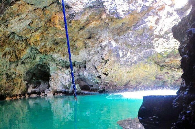 Blue Hole Mineral Spring and Rick's Cafe - Rick’s Cafe in Negril: Cliff-Jumping Show and Sunset Views