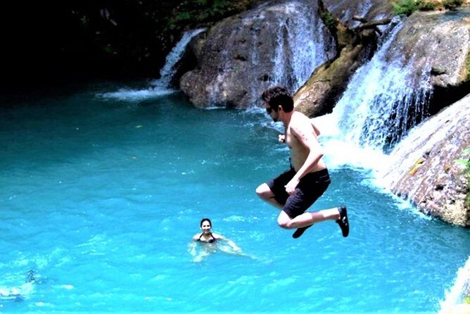 Blue Hole plus Secret Falls and Dunns River Falls Combo from Runaway Bay Hotels - Transport comfort: air-conditioned coach and guide help with crowd pressure