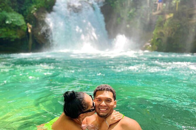 Blue Hole Waterfalls and Bamboo Rafting with Transportation - Blue Hole Secret Waterfalls: rope swings, pool time, and lifeguards