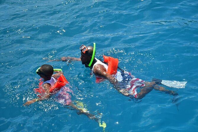 Boatride & Snorkeling then Margaritaville Hipstrip Activity - Getting There: Resort Pickup, Air-Conditioned Comfort, and Ramon’s Style