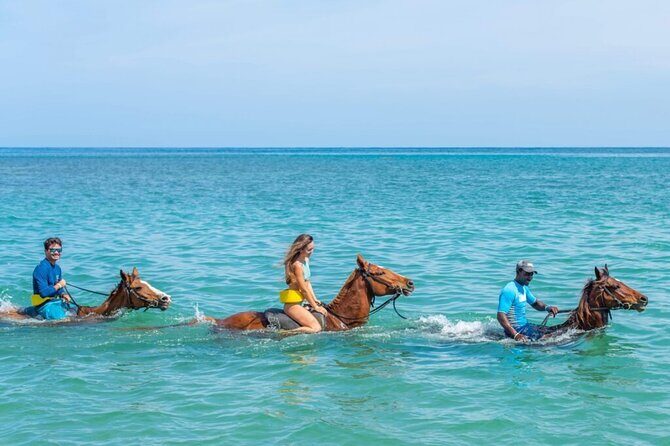 Catamaran, ATV and Horse Back Riding/Swim - Party Cruise on a Catamaran-Style Boat: Music and Rum Punch