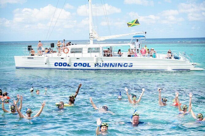 Catamaran Party Cruise and Snorkeling from Montego Bay - On the water: DJ, open bar, and the snack spread (yes, patties)