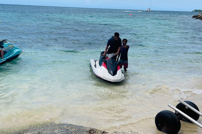 Customized Parasailing & JET-SKI - Parasailing handoff: Shuttle by small boat to the captain