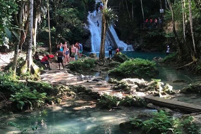 Dunn's River Falls and Blue Hole Tour Ocho Rios from Montego Bay - Dunn’s River Falls: The human-chain climb and the 600-foot work-out