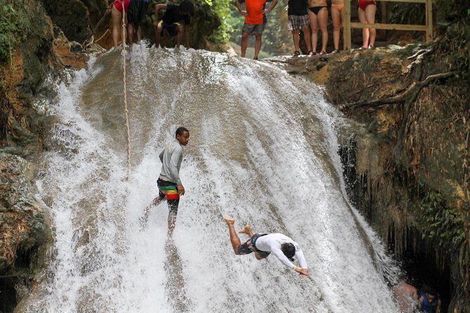 Dunn’s River Falls & Blue Hole Tour with Lunch - Stop 1 at Dunn’s River Falls: climb, grip, and cool off in the cascade