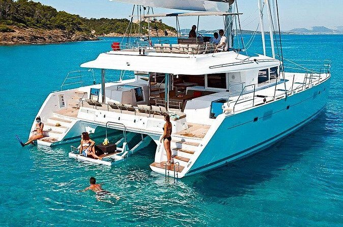 Dunn's River Falls Party Cruise, Blue Hole with Snorkeling, free beverages - The party catamaran: open bar, DJ music, and a social pace