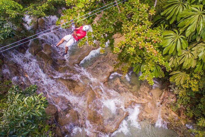 Dunns River Falls, Zipline, Bamboo Rafting, Horseback Ride Tour - White River bamboo rafting: 30ft bamboo + a cultural guide