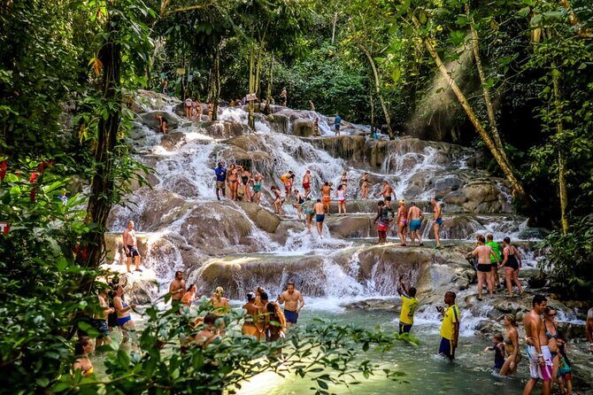 Dunns River Falls, Zipline, Bamboo Rafting, Horseback Ride Tour - Scotchies in Ocho Rios: jerk lunch time at your expense