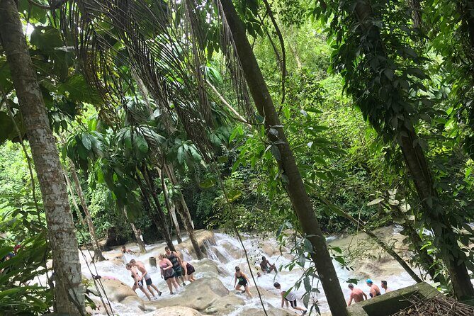 Dunns River Tour - The climb: how the guide turns slick rocks into a safe workout