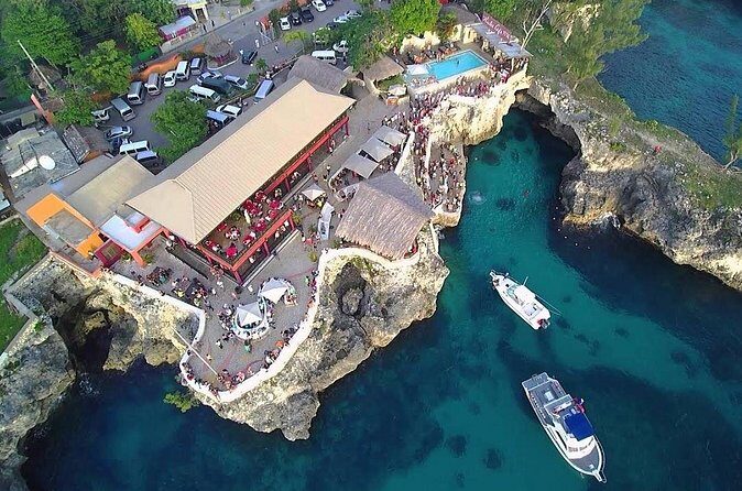 Experience Negril Seven Mile Beach & Jamaica's Famous Ricks Café - Rick’s Cafe for Reggae, Cocktails, and the Sunset View