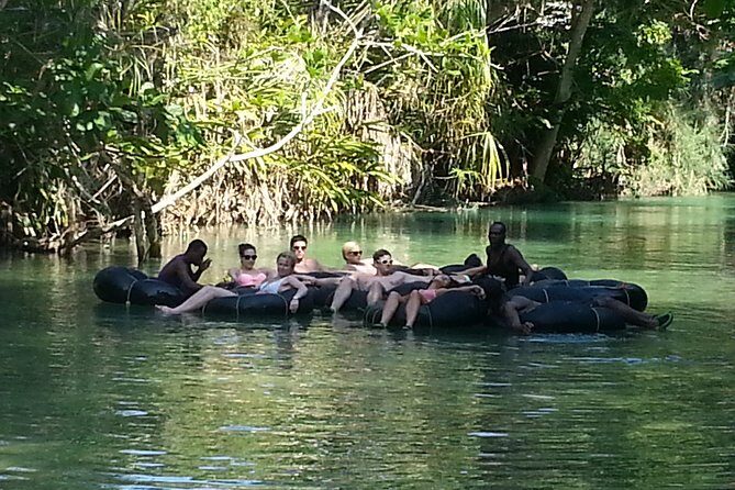 Falmouth Shore Excursion: Dunns River Falls and River Tubing Tour - The top of the falls: views, massage breaks, and a market you’ll actually want to browse