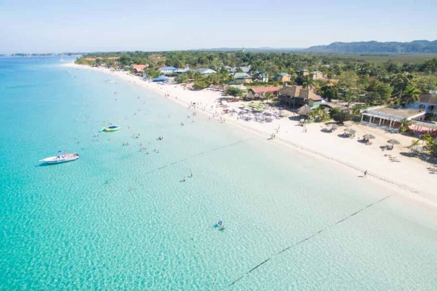 From Montego Bay/Falmouth: Negril Beach Catamaran Cruise - Seven Mile Beach Anchor Stop: Swim, Snorkel, or Just Float