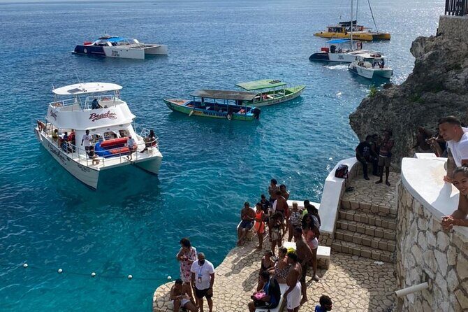 Full-Day Negril & Ricks Cafe Sunset Tour from Montego Bay - Rick’s Cafe Sunset: Cliff-Jump Moments, Local Music, and Bar Bites