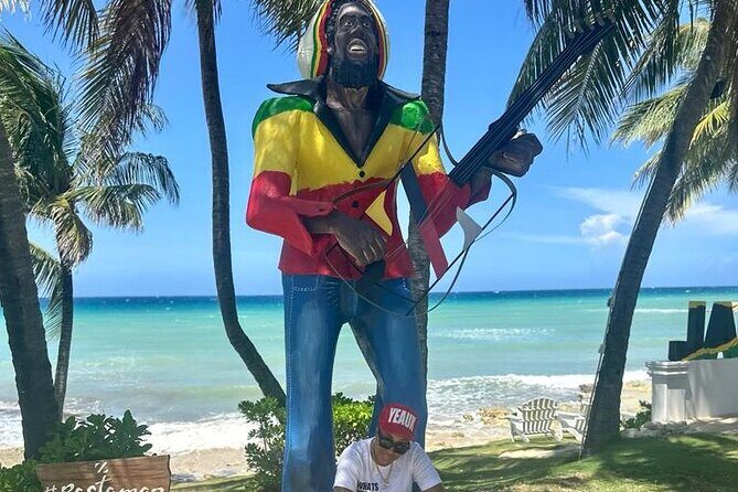 Full Day Tour of Negril Beach: Margaritaville & Rick's Cafe Live - Stop 1: Margaritaville Negril for food, music, and optional water fun