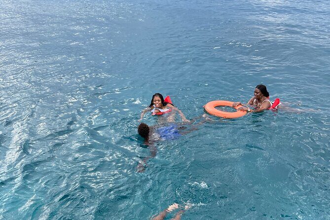 Half Day Catamaran Party Boat, Snorkeling and Hip Strip Tour - The Dreamer catamaran experience: nets, music, and real group energy