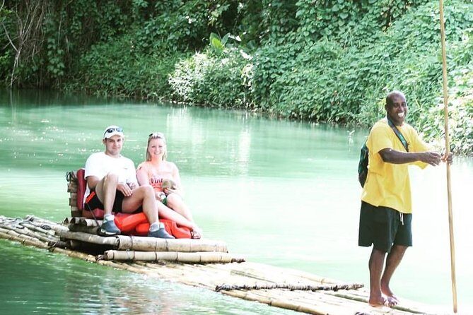 Half-Day Martha Brae River Rafting Tour from Ocho Rios - Martha Brae rafting on bamboo: calm water, expert help, and low-stress fun