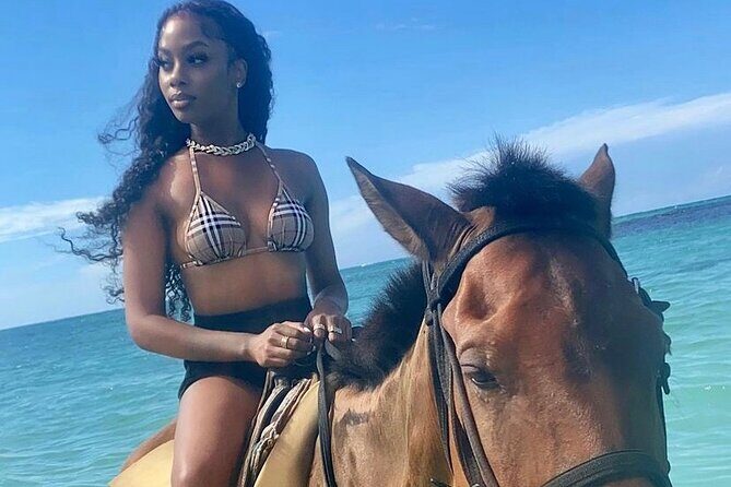 Horseback riding + Bamboo river rafting tour from Ocho Rios - Stop 2: Mammee Bay horseback riding through village, beach, and water