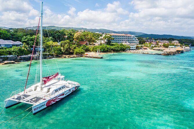 Lovers Rock Catamaran Cruise From Ocho Rios - Open Bar, Appetizers, and the Onboard DJ: How the Night Really Feels