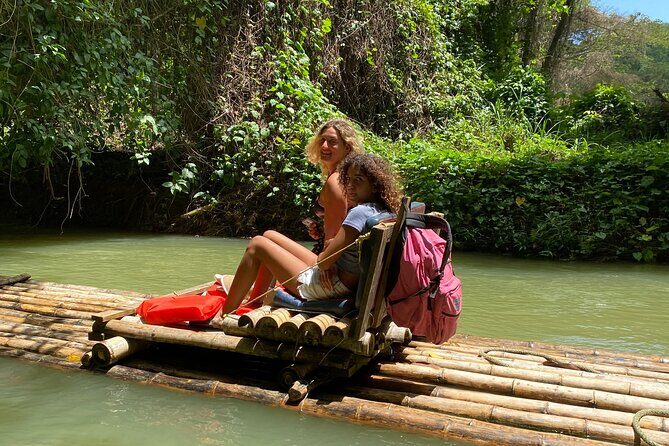 Martha Brae Bamboo Rafting From Montego Bay Resorts - Boarding the 30-foot bamboo raft: what the captain does for you
