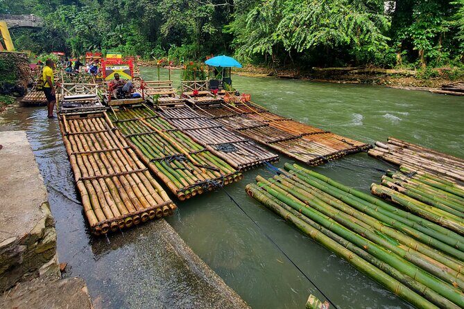 Montego Bay Bamboo Rafting & limestone Massage Private Transfer. - Arriving at Lethe River: stepping onto a bamboo raft