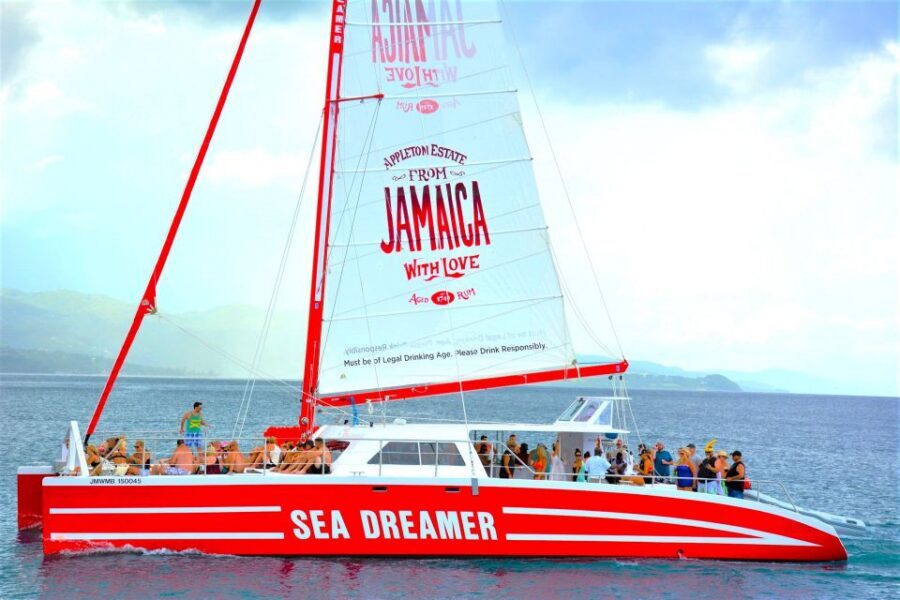 Montego Bay Catamaran Cruise and Snorkeling Tour - Onboard sailing: nets, music, and a crew that runs the day