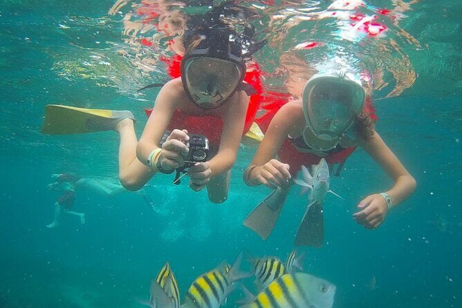 Montego Bay Catamaran: Snorkel Tour with Open Bar & Reggae DJ - Snorkeling in Montego Bay Marine Park: Gear Included, Entry Made Easy