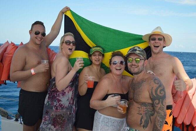 Montego Bay Catamaran: Snorkel Tour with Open Bar & Reggae DJ - Open Bar and Light Snacks: What Unlimited Drinks Really Means Here