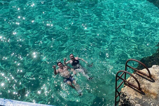 Negril day! beach and west end Cliffs with French Guide - Negril Beach Time: 7 Miles of Sand, and the Chance to Pick Your Mood