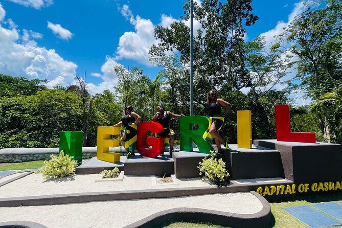 Negril Glass Bottom Boat Tour+Snorkeling visit Booby cay island - Negril’s Seven Mile Beach + Margaritaville: your mid-day reset