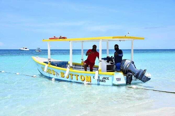 Negril Ricks cruise PLUS Booby Cay Lobster & Cave Snorkeling - Rick’s Cafe from the sea: sunset views, music, and optional cliff time