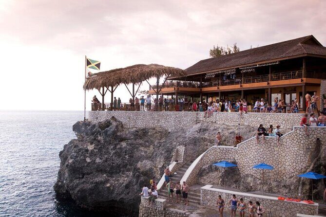 Negrils Seven Miles Beach, Rick's cafe and Parasailing Tour. - Montego Bay to Negril: The Ride Builds the Day