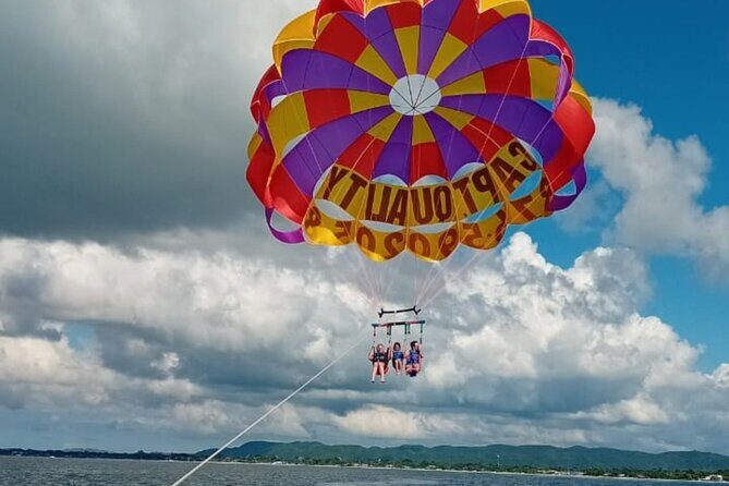Negrils Seven Miles Beach, Rick's cafe and Parasailing Tour. - Seven-Mile Beach Time: Sand, Shopping, and That DJ Beat