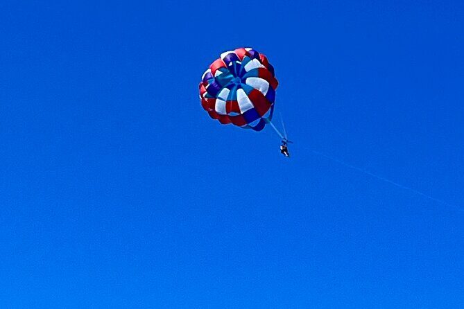 Parasailing above Turquoise Ocean Waters in Montego Bay - Beach Time Afterward: Swim, Splash, and Take It Down a Notch