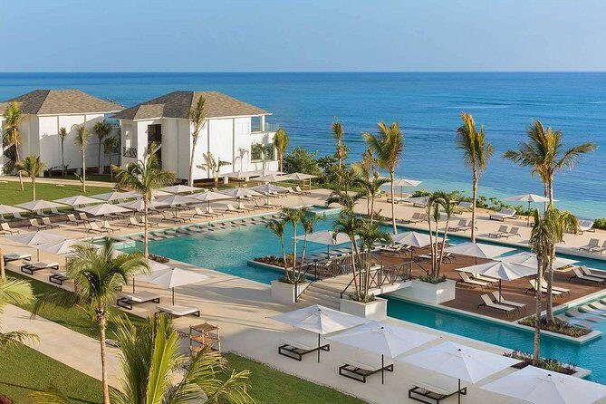 Private Airport Transfer to Excellence Oyster Bay - The Comfort Upgrade: Air-Conditioned, Plush Seating, and Real Restraints
