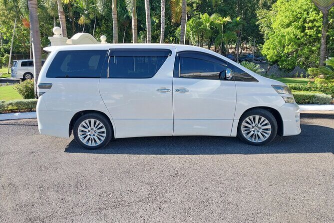 Private Airport Transfer to Hotel Riu Palace Aquarelle - The scenic drive route: Montego Bay sign, Rose Hall, and Trelawny coast