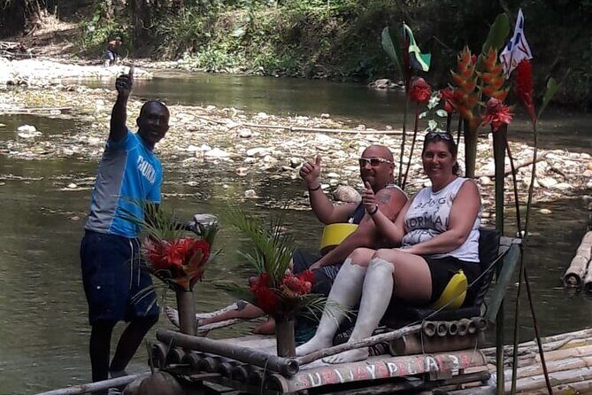 Private Bamboo Rafting along Great River with Pickup - Great River scenery: hills, vegetation, and a calmer pace