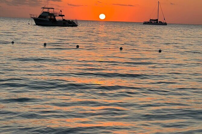 Rick's Cafe & Shopping in Negril - Stop 1 at Rick’s Cafe: Sunset, Reggae, and Your Jump Decision