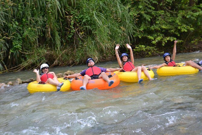 River Rapids River Tubing Adventure Tour from Falmouth - On the river: inner tube comfort, calm sections, and Class II splashes