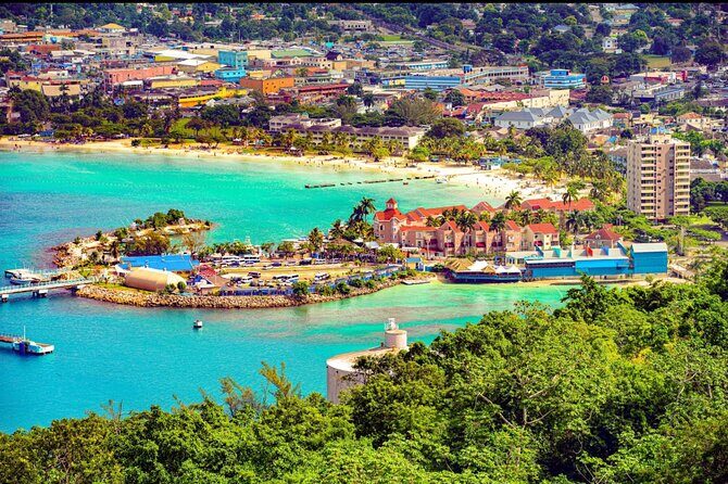Runaway Bay Transportation Tour Experience - Shoreline strolling with reggae in the background