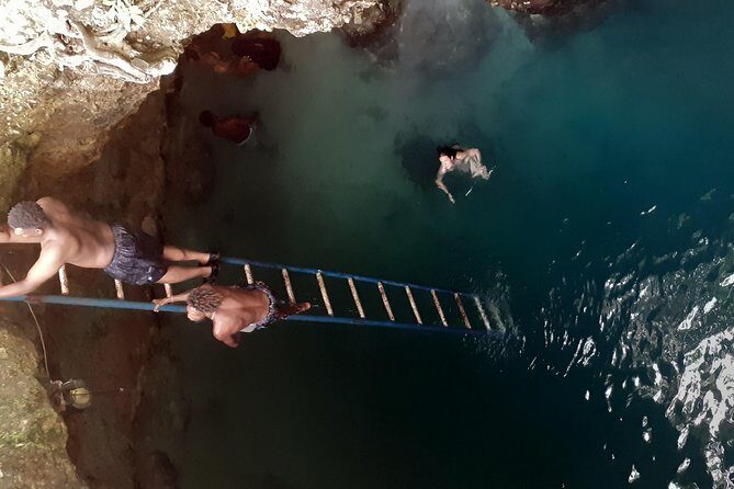 Stepping High Mountain Tour and Blue Hole Mineral Spring from Negril - Blue Hole Mineral Spring: limestone walls, mineral water, and safe access