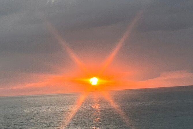 Tour to Negril 7 Miles Beach and Rick’s Cafe from Montego Bay - Rick’s Cafe: the sunset show with real cliff-jumping energy